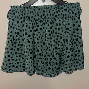 Green Dalmatian print shorts
